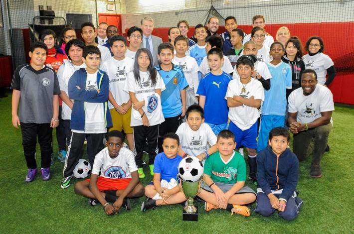 Vance with soccer troupe