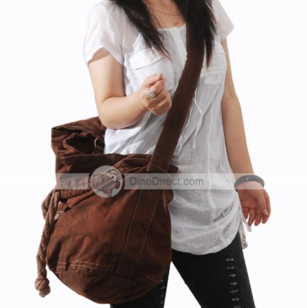 woman carrying large canvas tote bag
